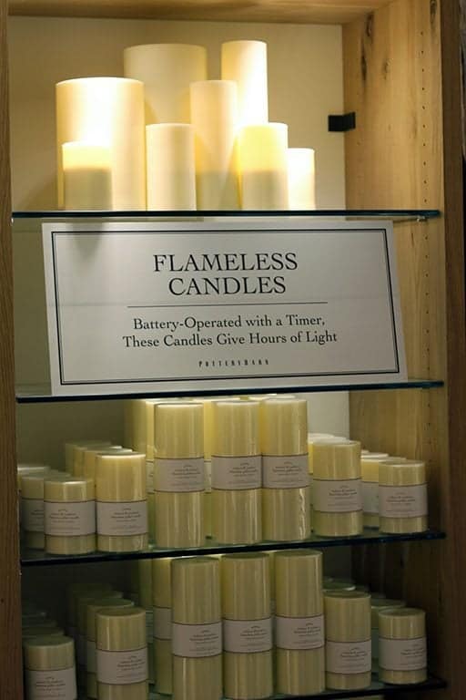 timer operated flameless candles in shelving