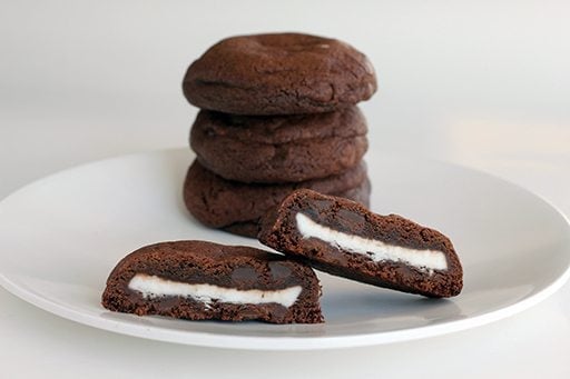 Stack of Double Mint Stuffed Chocolate Chip Cookies in a White Plate