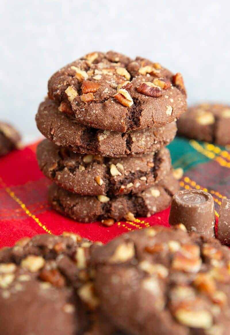 close up stack of Rolo cookies with pecans