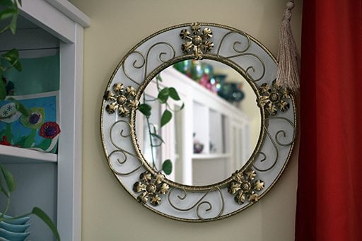 a retro round wall mirror