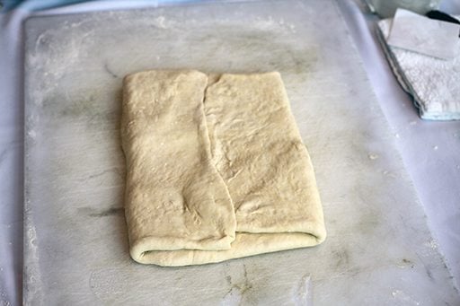 folded dough with butter inside turned into rectangle shape