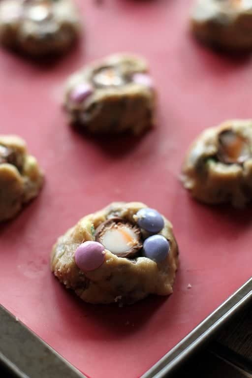Easter Cookie dough with chopped candies on it in a cookie sheet