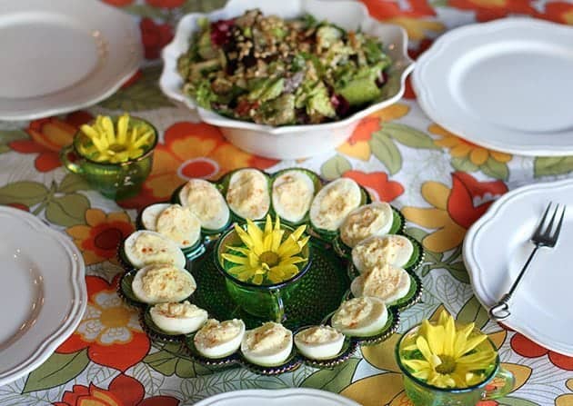 Sunday table with classic deviled eggs in green egg plate