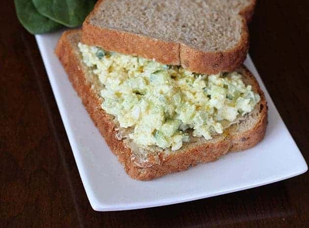 Curried Egg Salad Sandwich in a white rectangular plate