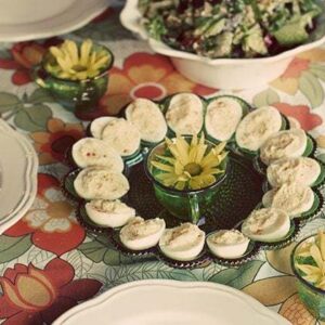 Sunday table with classic deviled eggs in green egg plate 70's edition