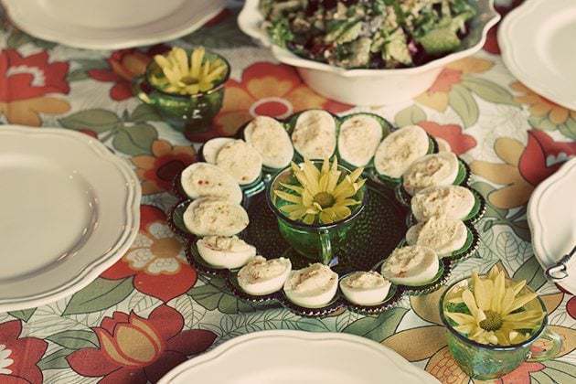 Sunday table with classic deviled eggs in green egg plate 70's edition