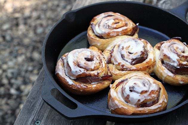 5 pieces Bacon Stuffed Cinnamon Buns in a Skillet