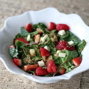 Strawberry Quinoa Salad With Brie in a White Bowl