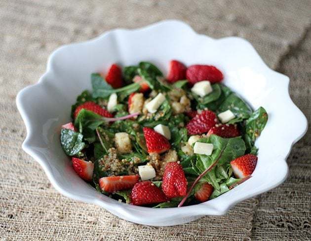 bowl of strawberry quinoa salad with brie