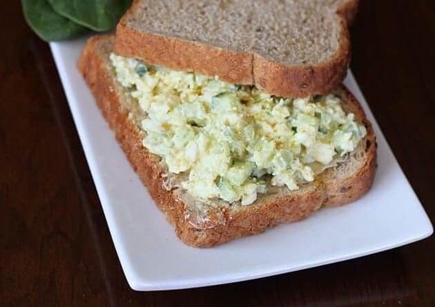 Curried Egg Salad Sandwich in a white rectangular plate