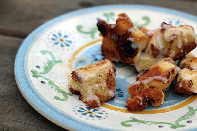 close up of cheater skillet monkey bread in vintage plate