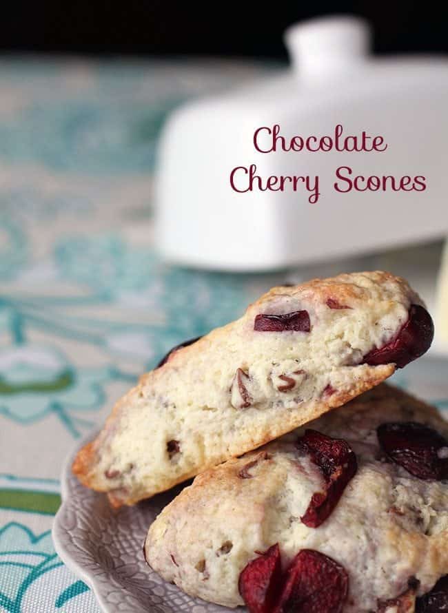 close up of three chocolate cherry scones in a plate