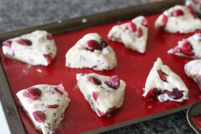 Pizza shape Chocolate Cherry Scones dough placed in baking sheet ready for baking