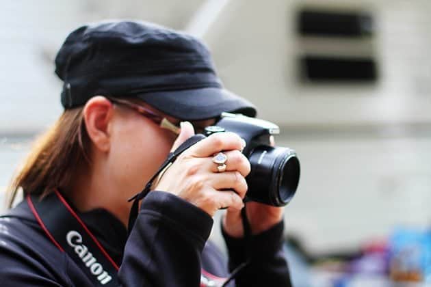 lady practicing shooting with camera