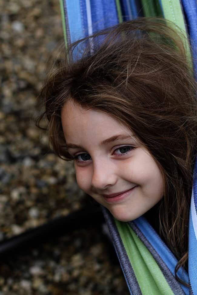 close up of young girl in a hammock