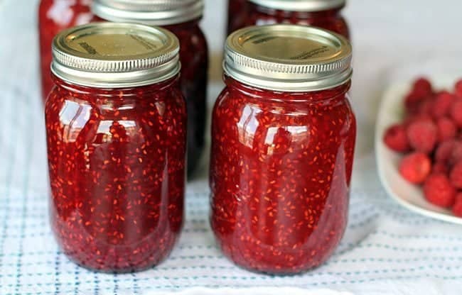 Sealed Jars of Homemade Raspberry Jam 