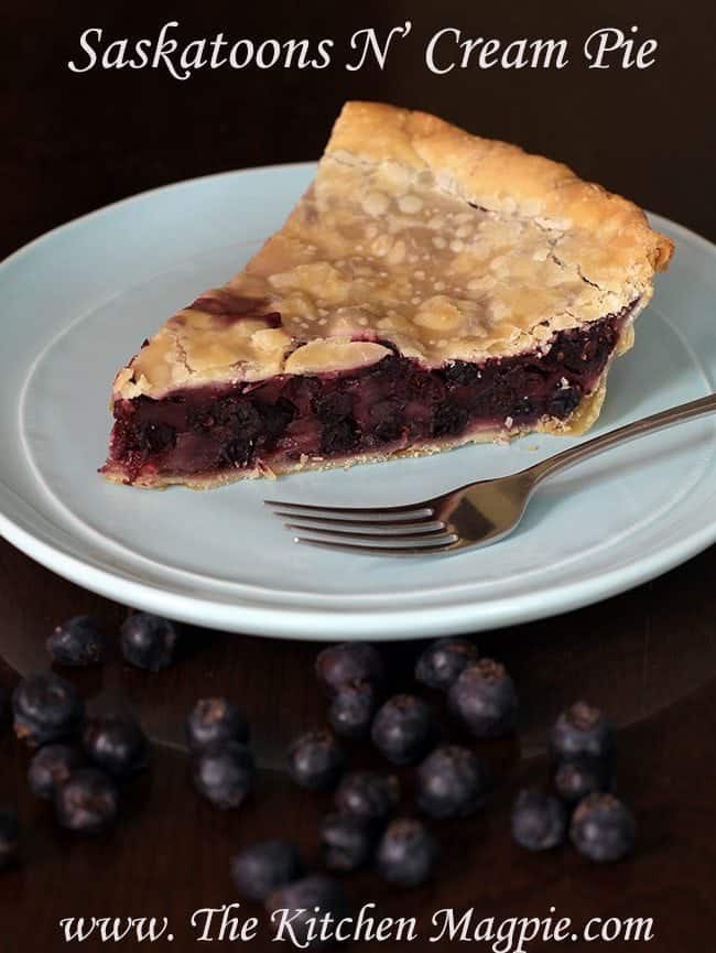 slice of saskatoon pie with a firm cream pie