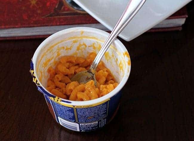 pre-made Kraft dinner bowl with spoon in it