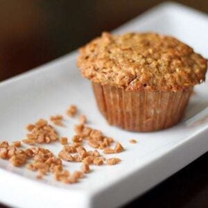 Oatmeal Banana Muffins in a rectangular white plate with Skor bits