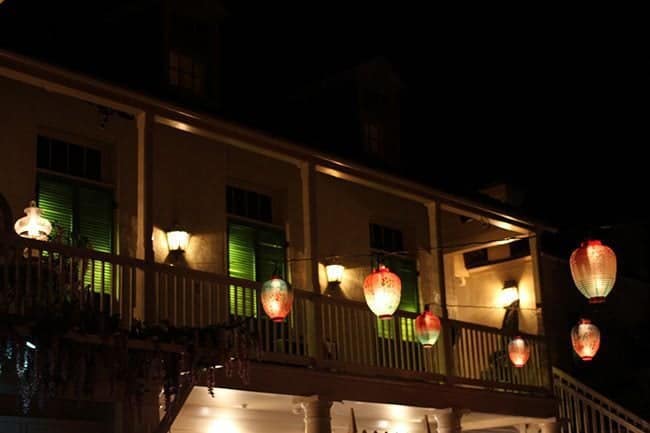 night view of the restaurant with Spanish moss hangs from the buildings
