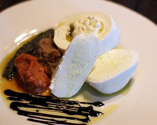 Buratta - a soft mozzarella encased in outer shell of firmer cheese