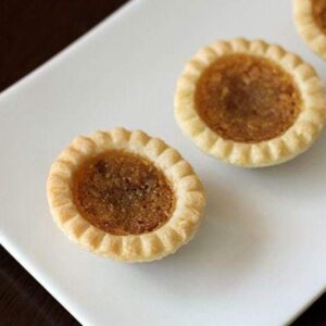 Treacle Tarts in a rectangular white plate