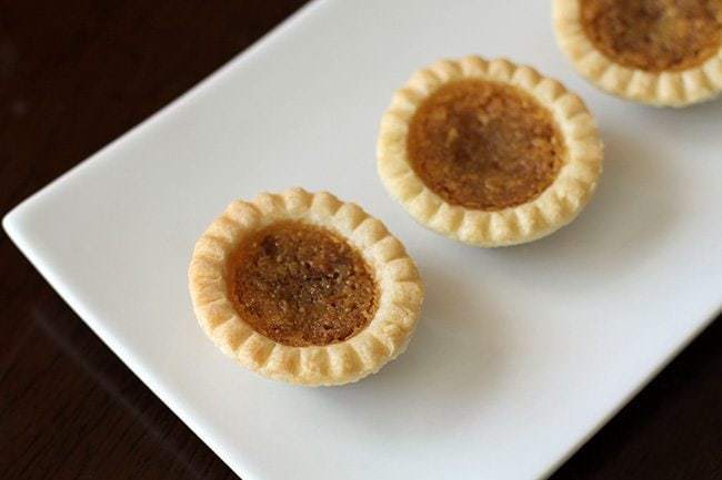 Treacle Tarts in a rectangular white plate