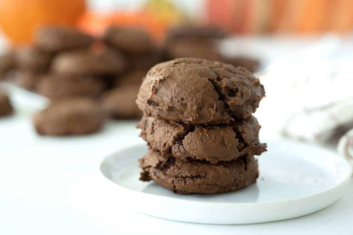 Three Pieces Double Chocolate Chip Pumpkin Cookies on a white plate