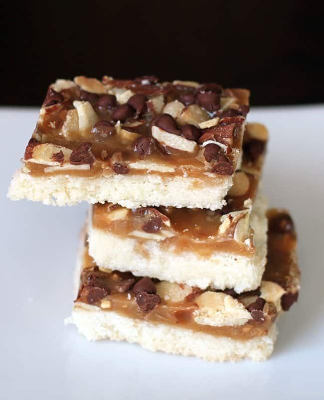crunchy toffee bars - shortbread base with toffee, chocolate chips and almonds baked on top