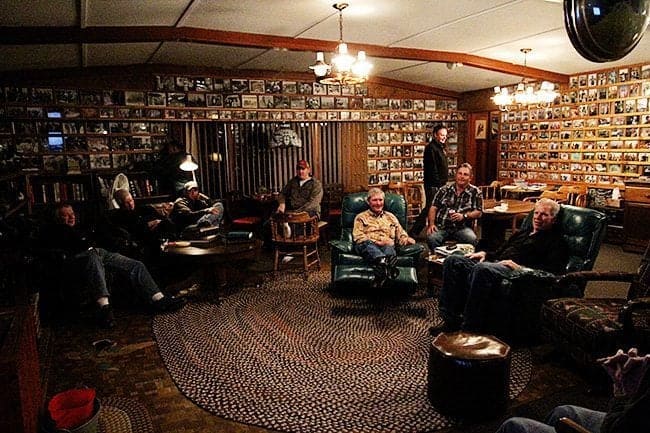 common room at Jimmy Robinson's Duck Lodge during night occupied by duck hunters