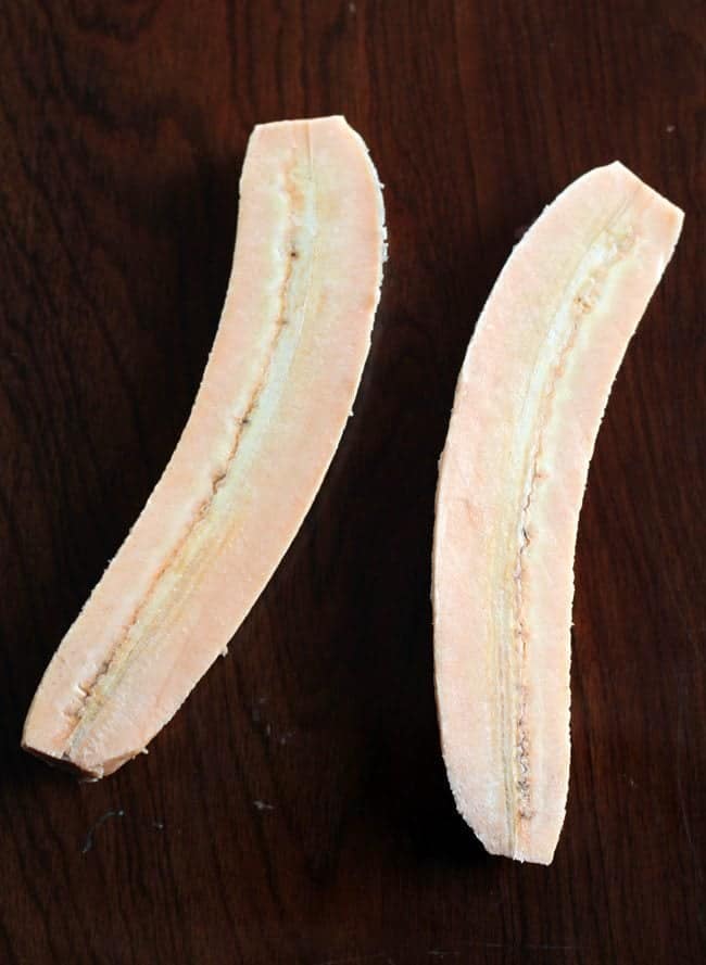 Plantains sliced in half length-wise