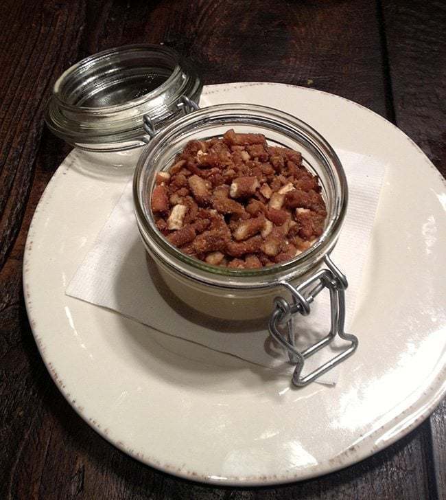 Glenlivet Infused Butterscotch Pudding in a transparent container on a white plate