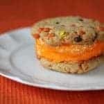 PB Halloween Ice Cream Sandwich Cookies in a middle of white plate in red background