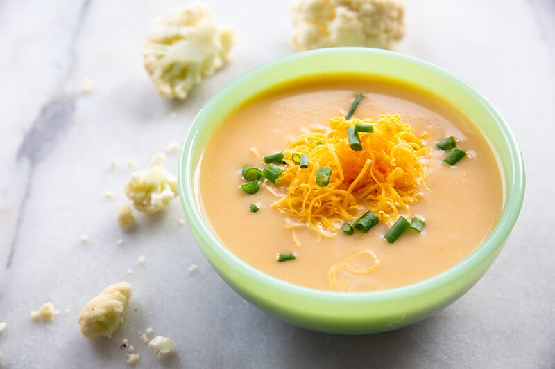 Cheesy Cream of Cauliflower Soup in a soup bowl