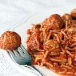 Crock Pot Spaghetti & Meatballs in white Plate on White tablecloth