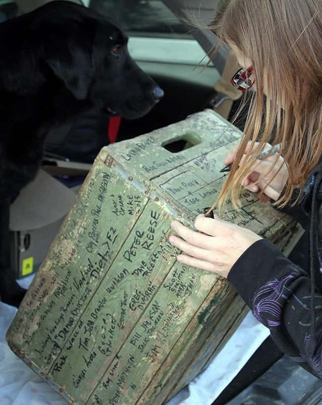 writing name on the old duck box