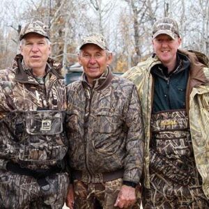 three men wearing duck hunting gears