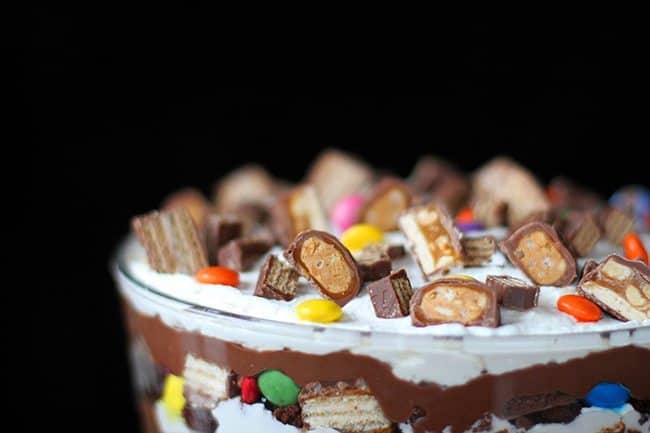 top layer of Brownie Trifle with chopped candy and chocolate bars