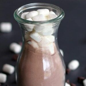 Close up Jar of Hot Cocoa Topped with White Marshmallows