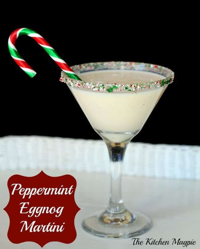 A glass of Peppermint eggnog martini with candy crane