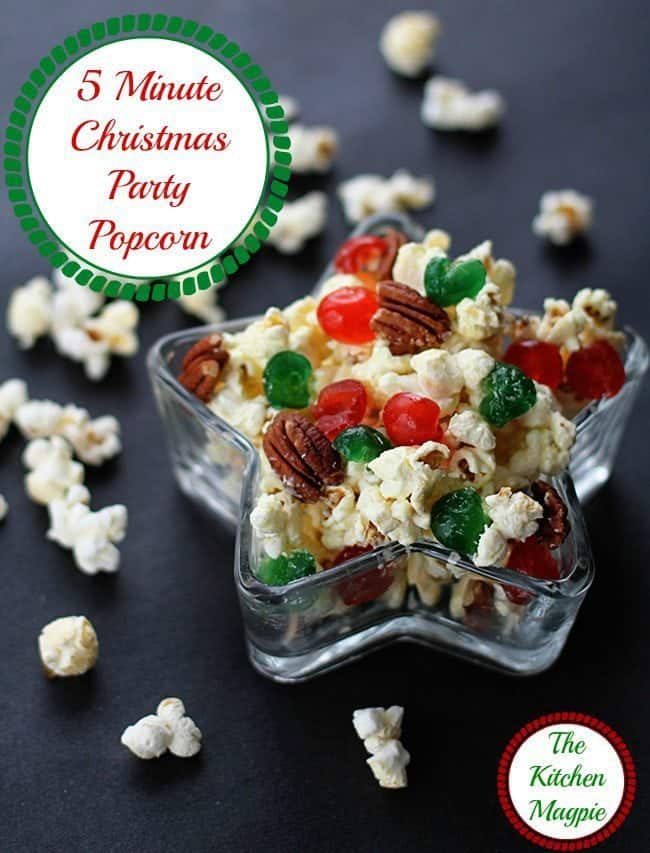 Close up of Christmas Popcorn in with colored cherries and pecans in a Star Shaped Container