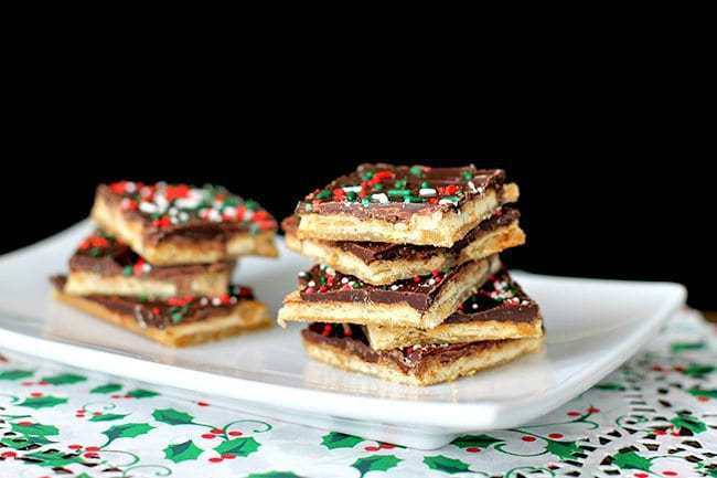 Close up of Saltine Toffee Squares in a White Plate