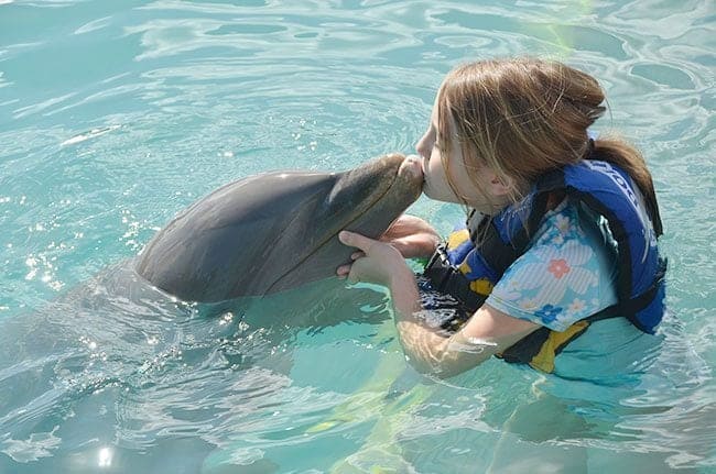 young girl with the dolphin kiss