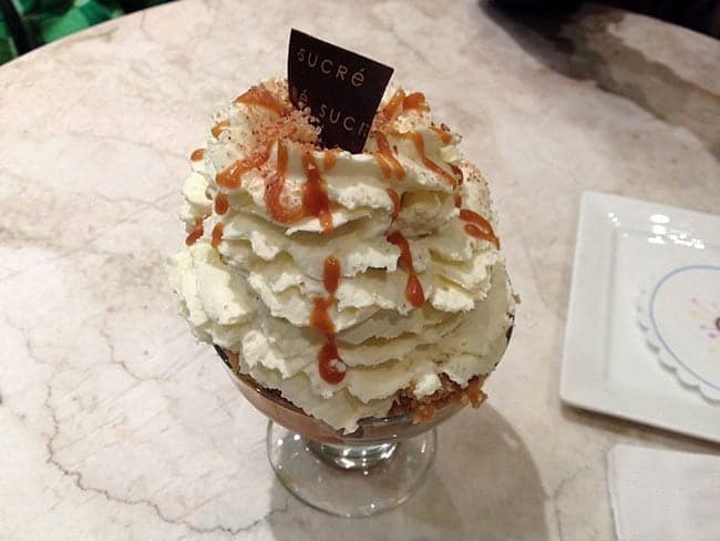 Sundae with butter pecan gelato, bread pudding chunks, sugar-coated pecans and Banana's Foster sauce