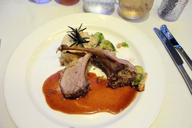 serving of lamb shank in a white plate