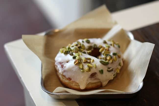 Brown Butter Pistachio Donut with brown sugar glaze and toasted pistachios on top