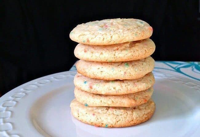 Close up stack of Rainbow Bit Cake Mix Cookies in a White Plate