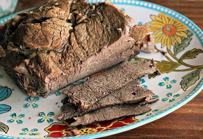 roast beef in a floral plate