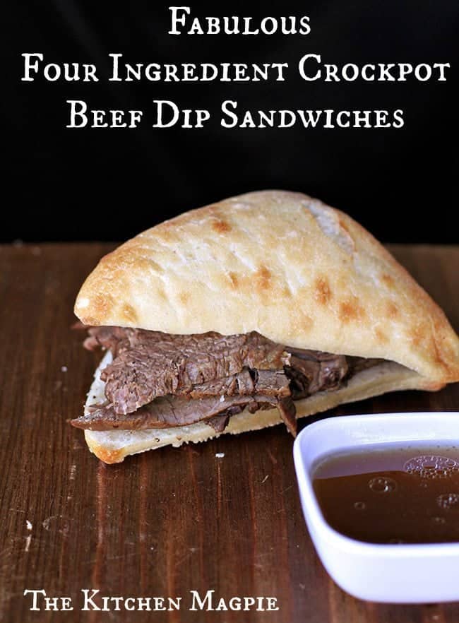 Beef Sandwich and Dip Sauce on Wood Background