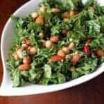 Kale & Mixed Bean Salad with homemade vinaigrette in a white leaf shaped bowl